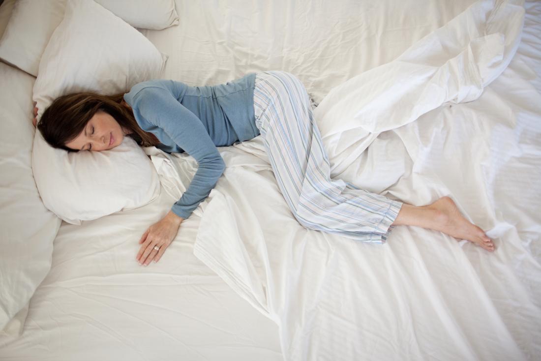 Woman sleeping in bed