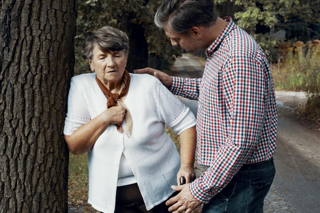 senior woman having problems breathing