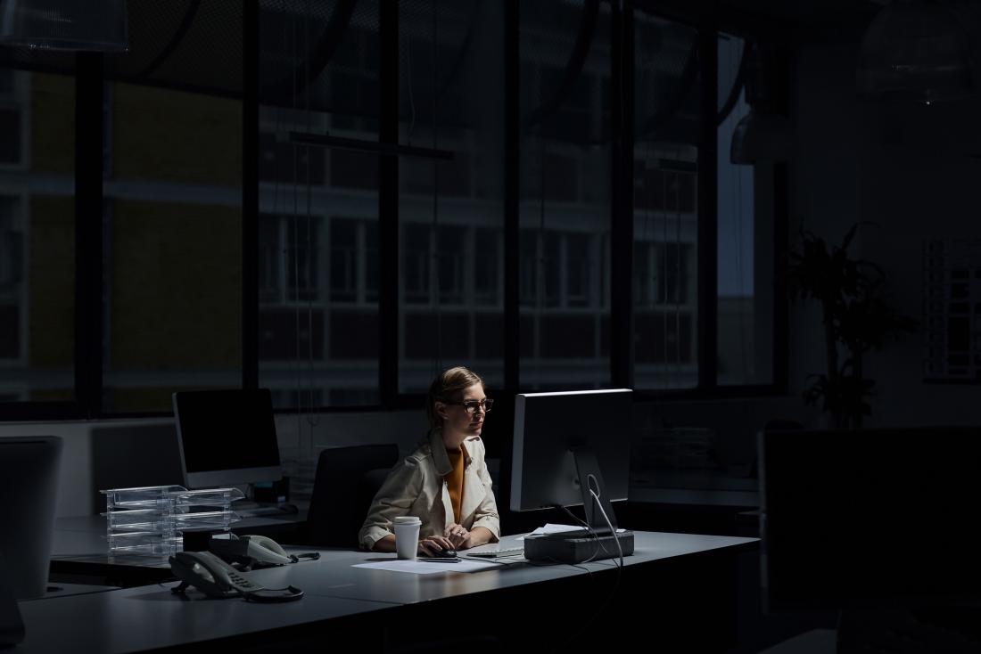 Woman working late