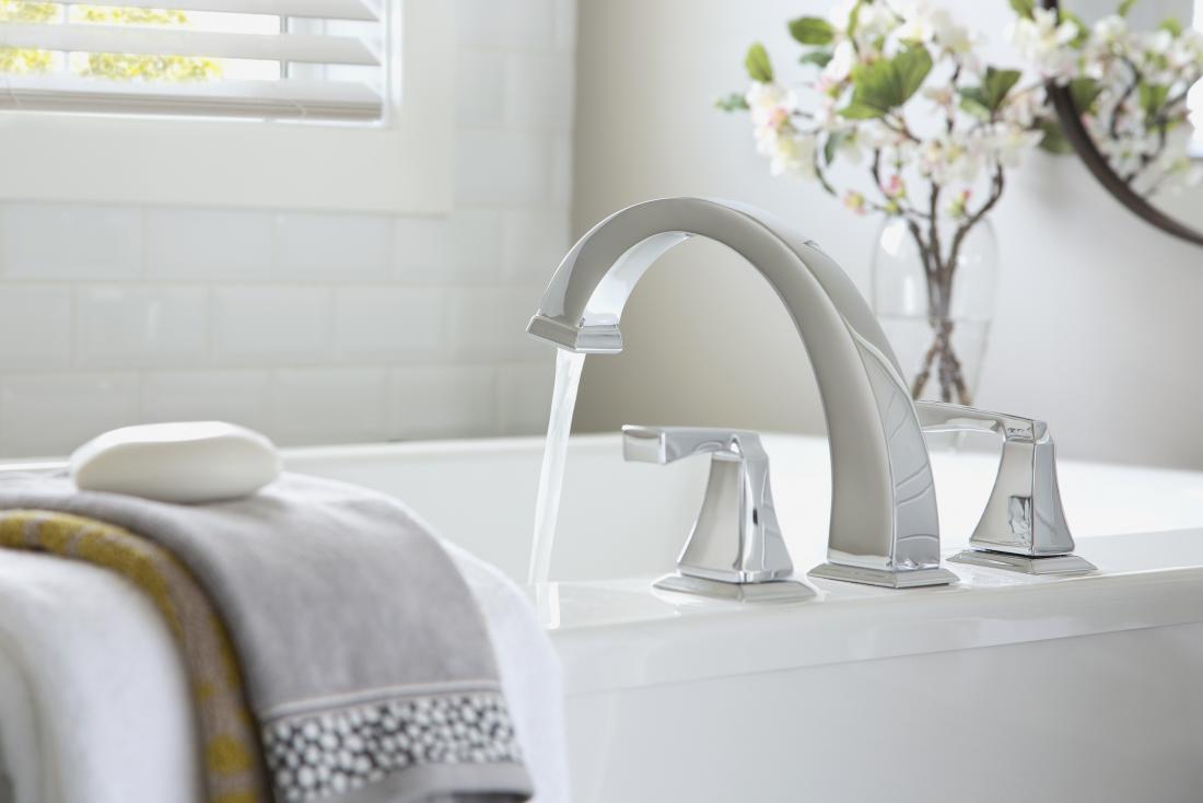 Running water from tap into bath