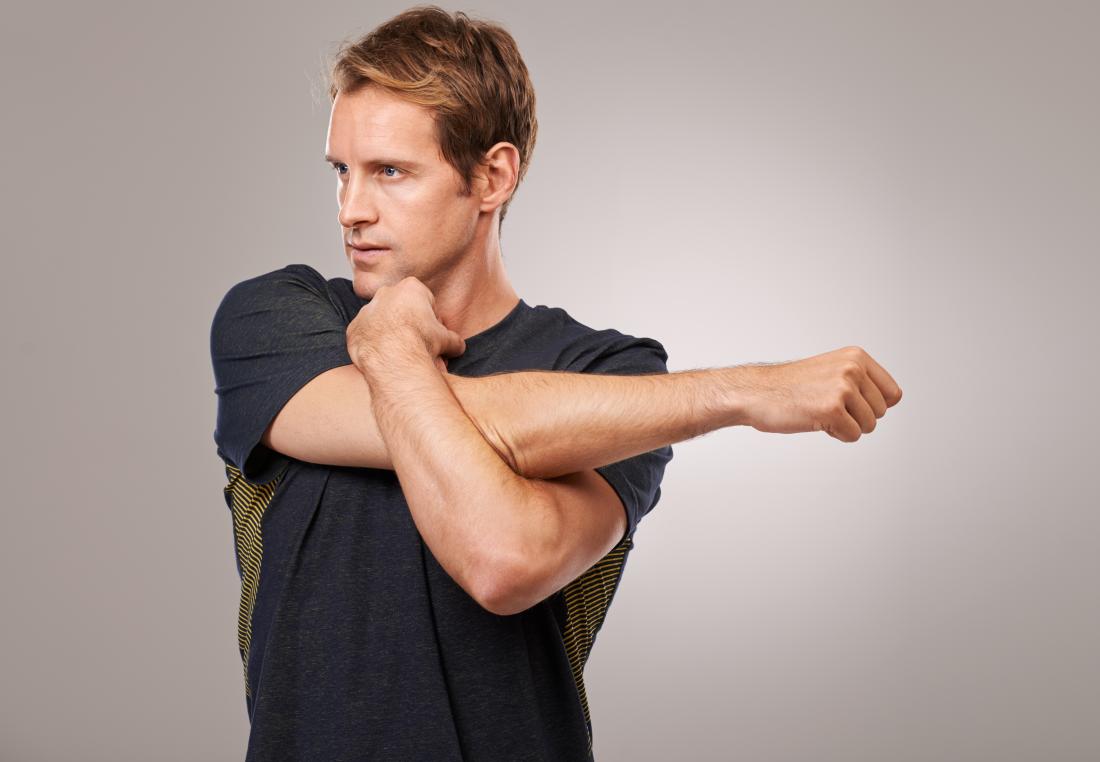 Man doing the right shoulder stretch to improve flexibility