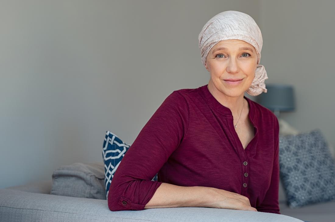 middle aged cancer survivor looking at camera