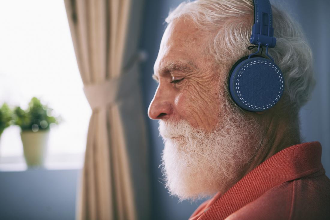Older adult listening to music