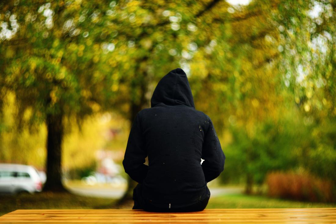 sad person turning away from the camera