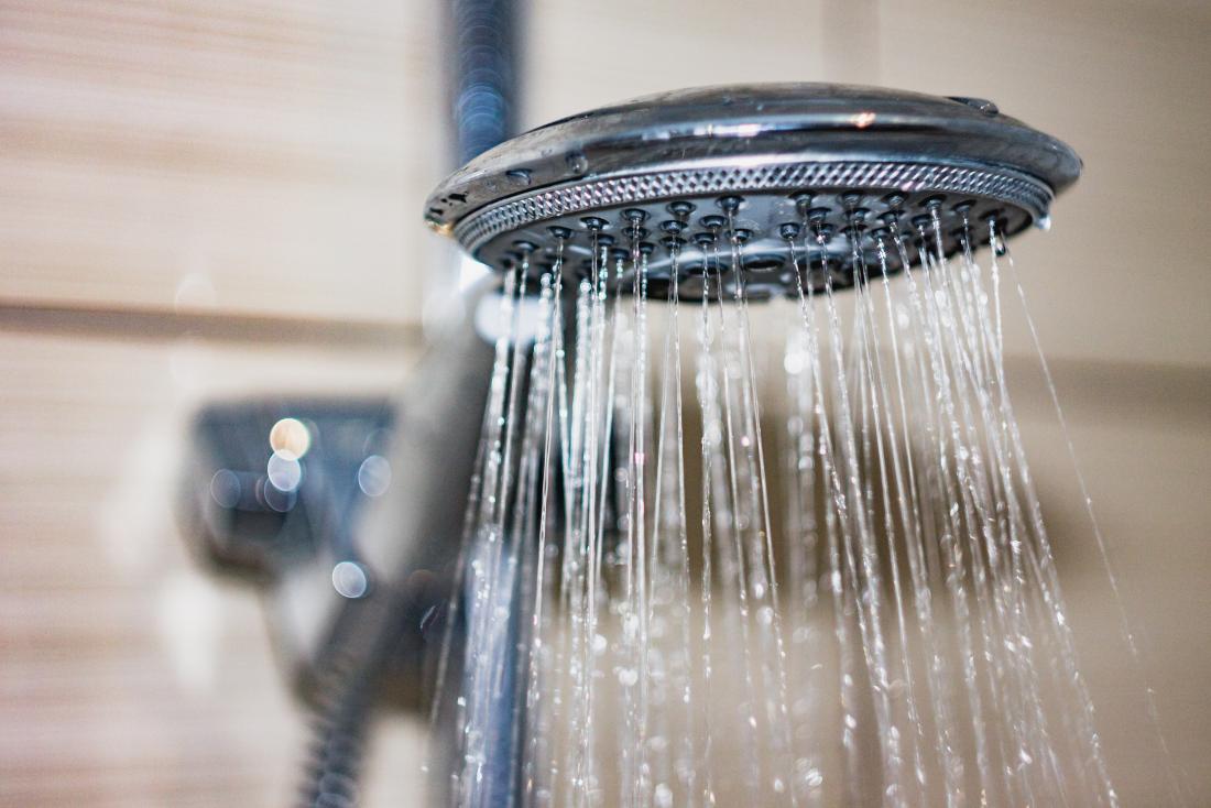 Regular showers can help loosen earwax.
