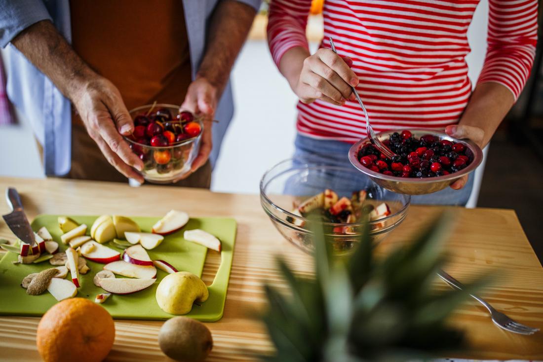 https://cdn-prod.medicalnewstoday.com/content/images/articles/325/325141/people-making-a-fruit-salad-in-kitchen-using-berries-and-apples-for-whole30-diet.jpg