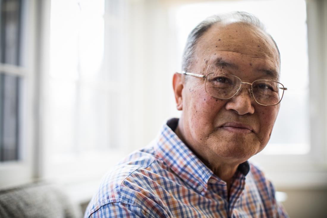 portrait of older man with glasses