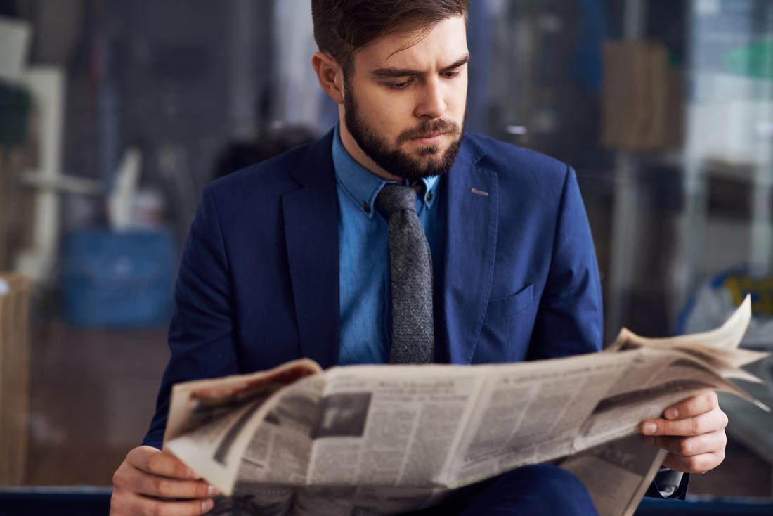 Man reading a newspaper