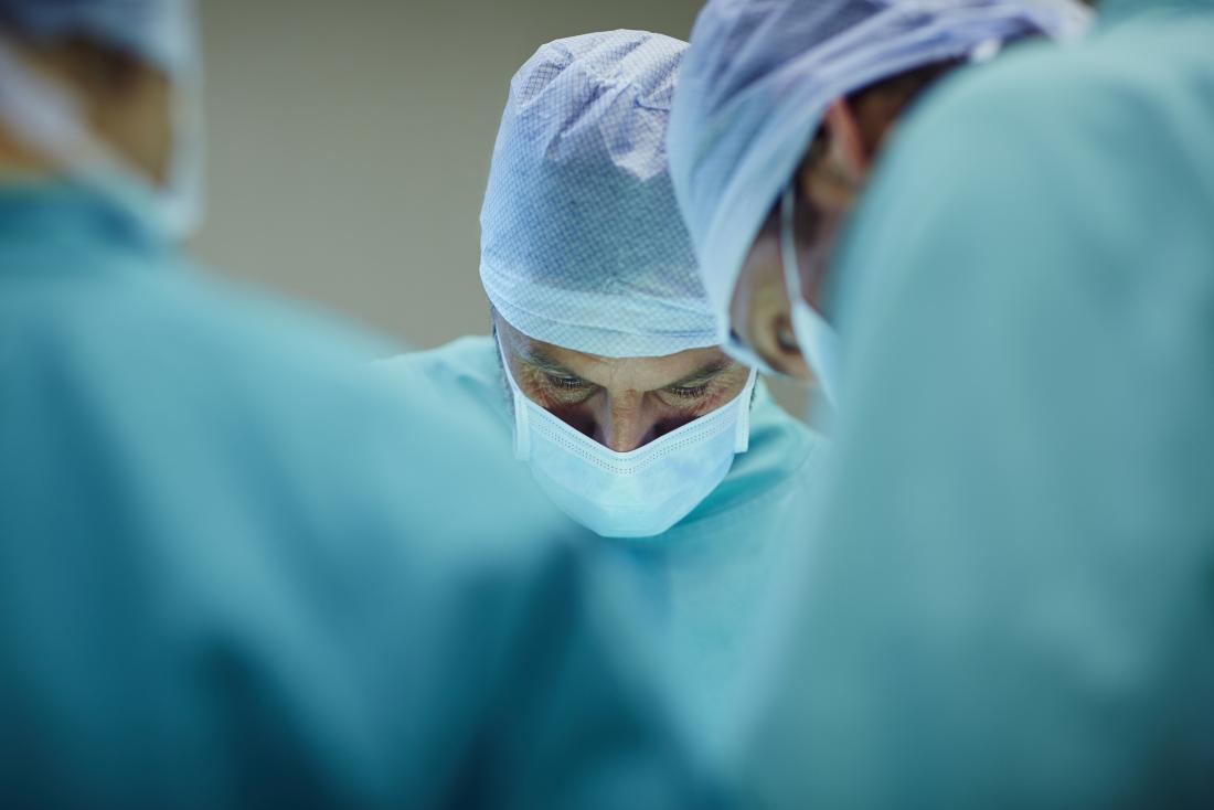 surgeons working on surgery for ms