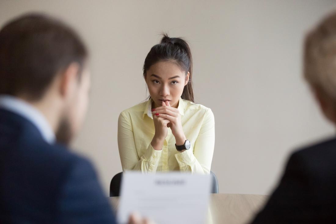 young woman looking nervous at interview
