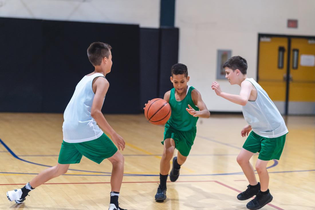 Children playing basketball