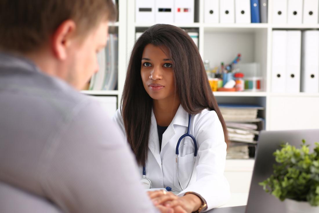 Doctor speaking with patient