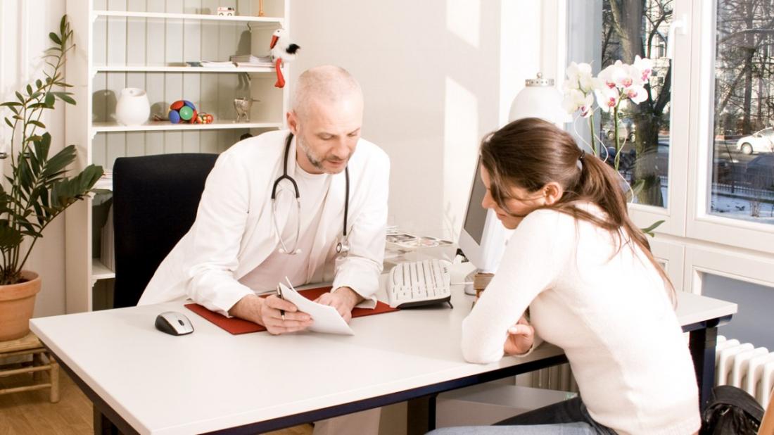 doctor and patient in office discussing humira for crohn s