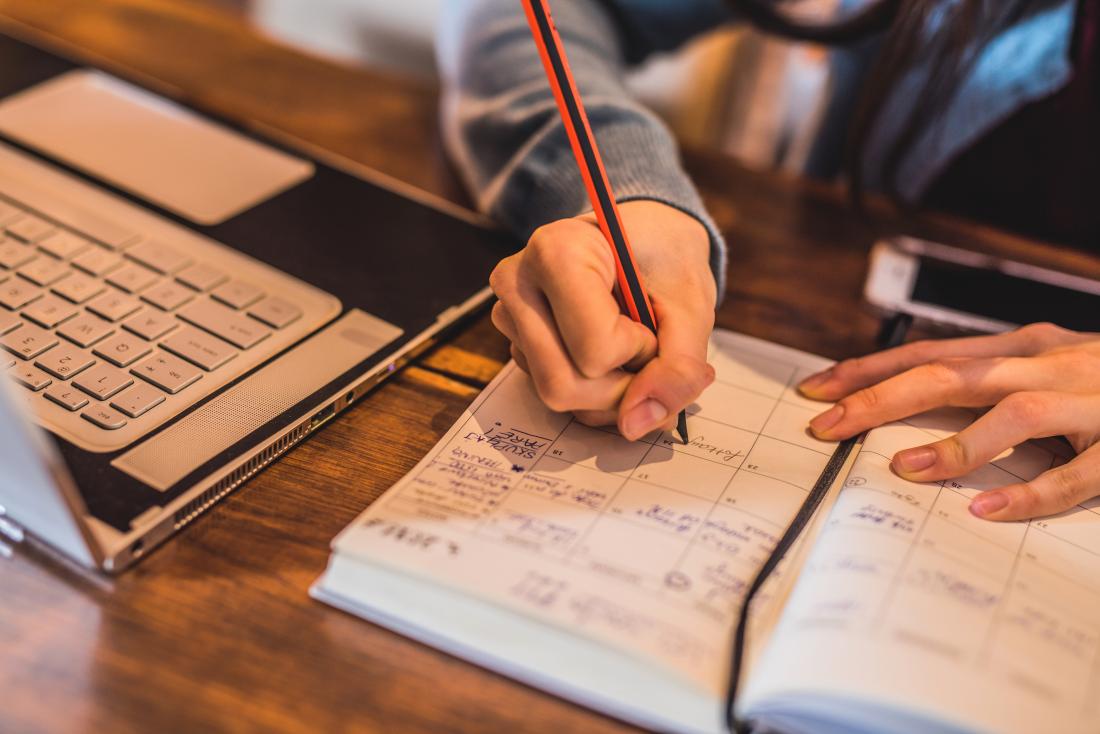 Person writing in a diary
