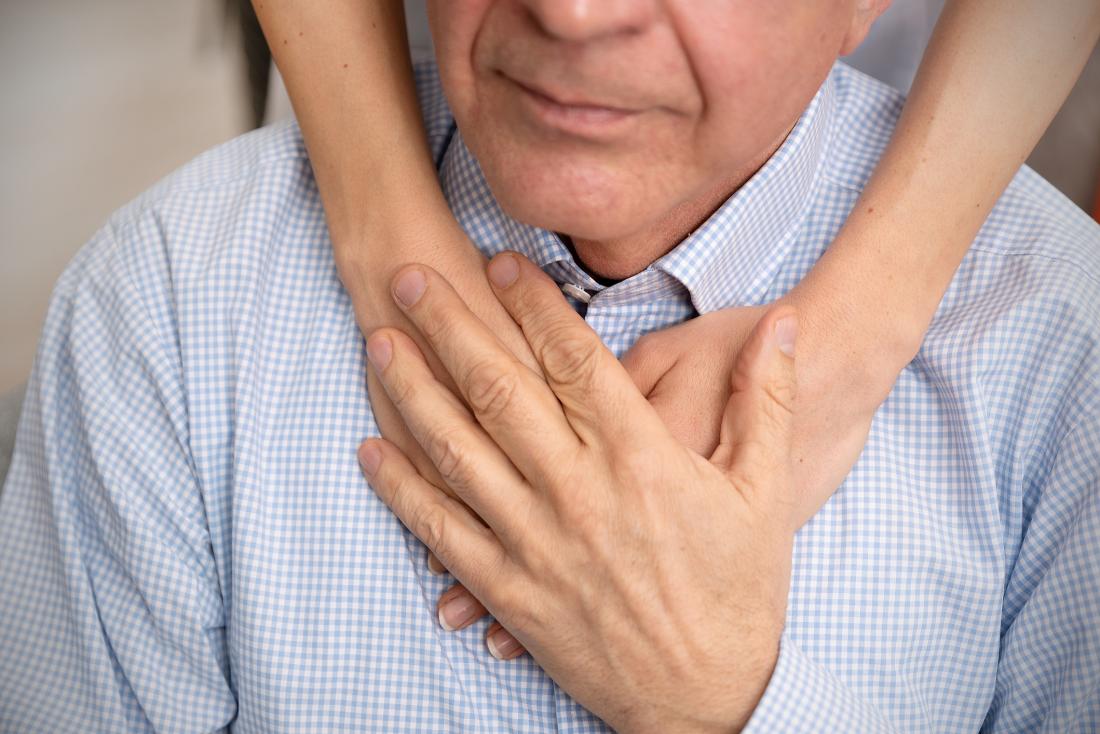 Older adult being comforted