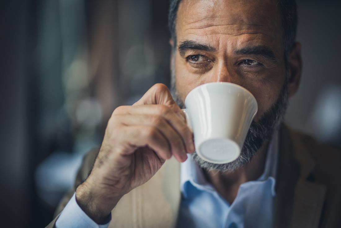 man drinking coffee