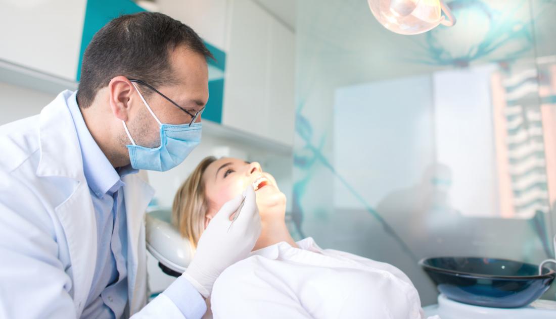female patient at dentist