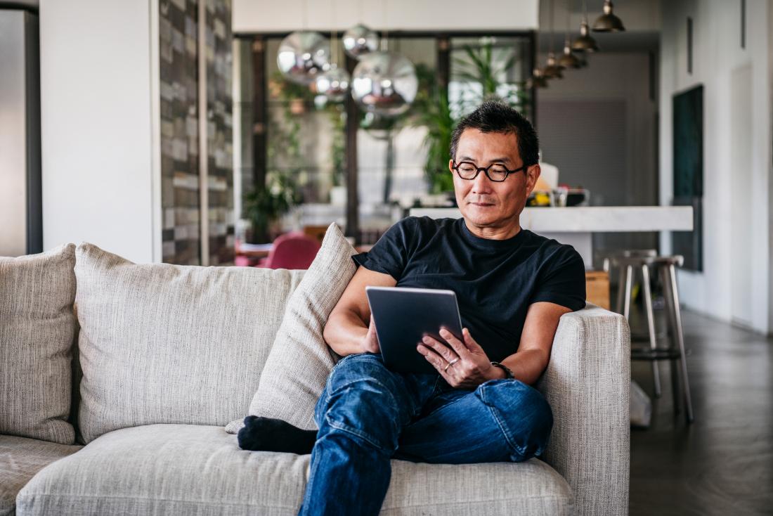 a man improving his memory with a brain training exercise on an iPad