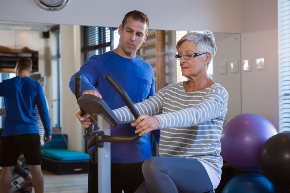 older person on stationary bike