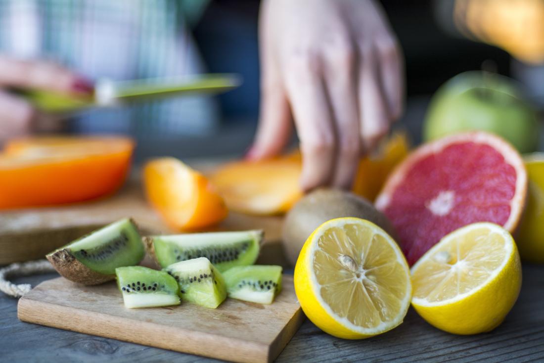 a person preparing fruit that may contain too much vitamin c 