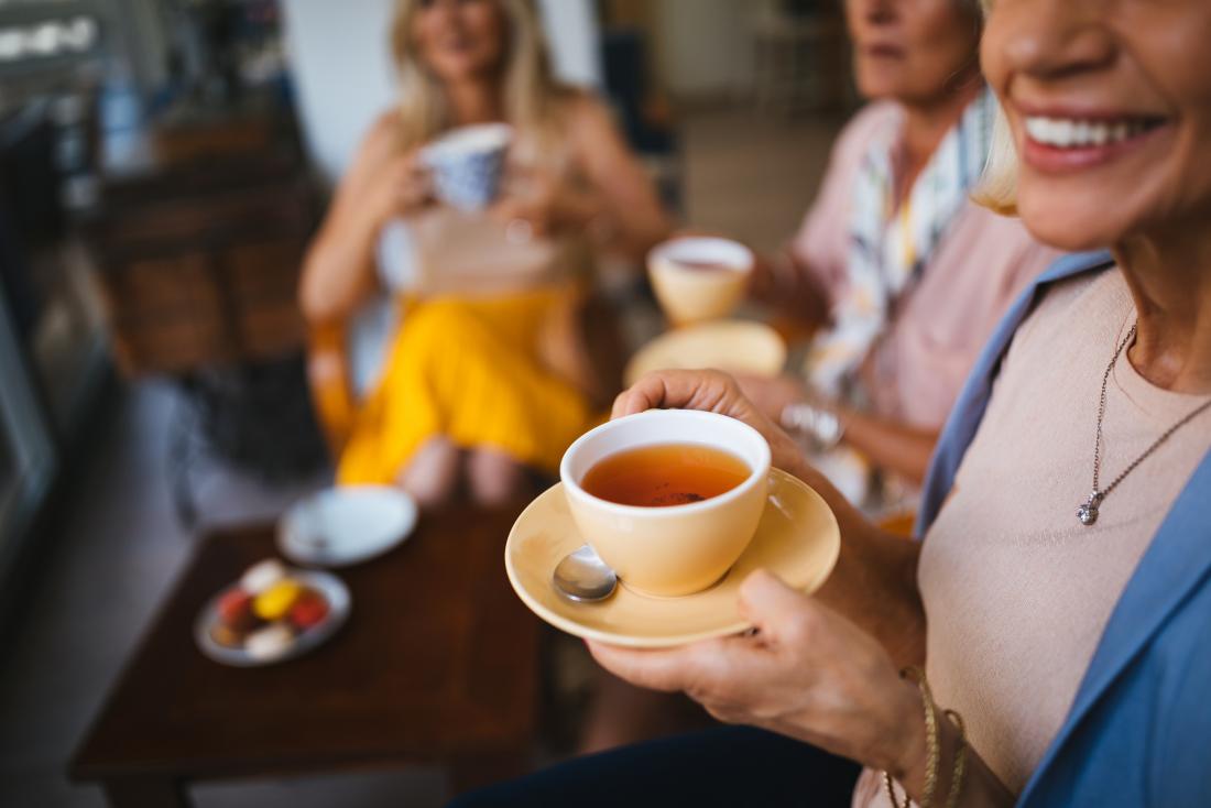 People on sale drinking tea