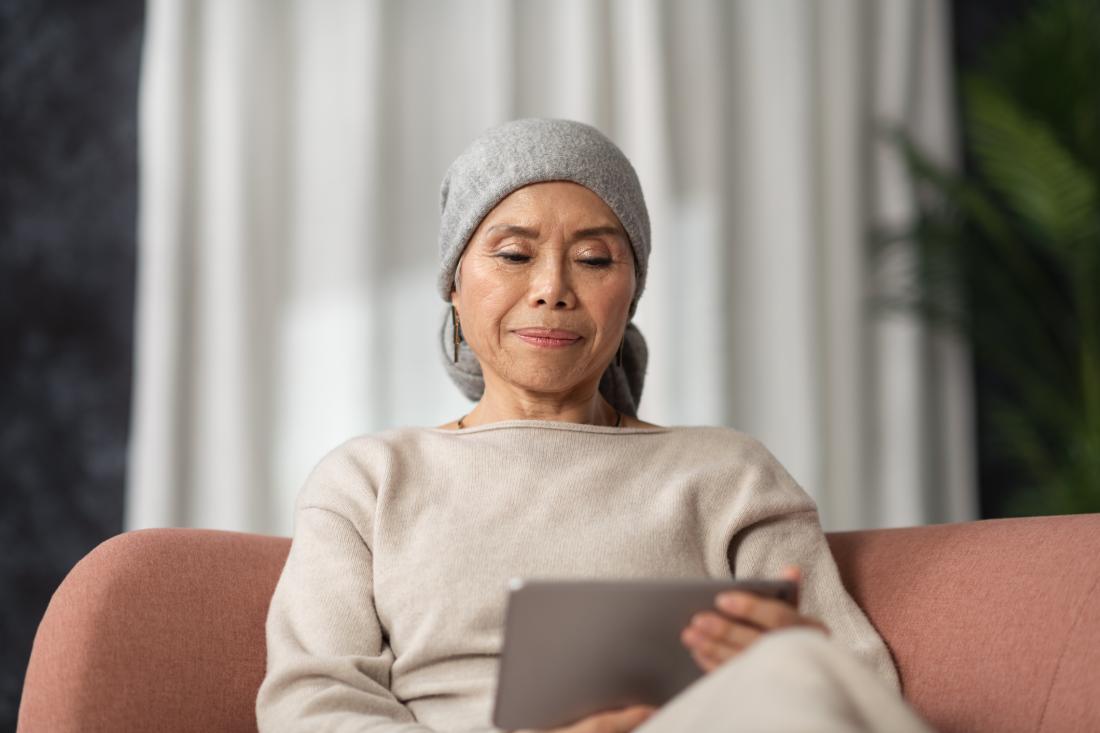 woman reading something on a tablet