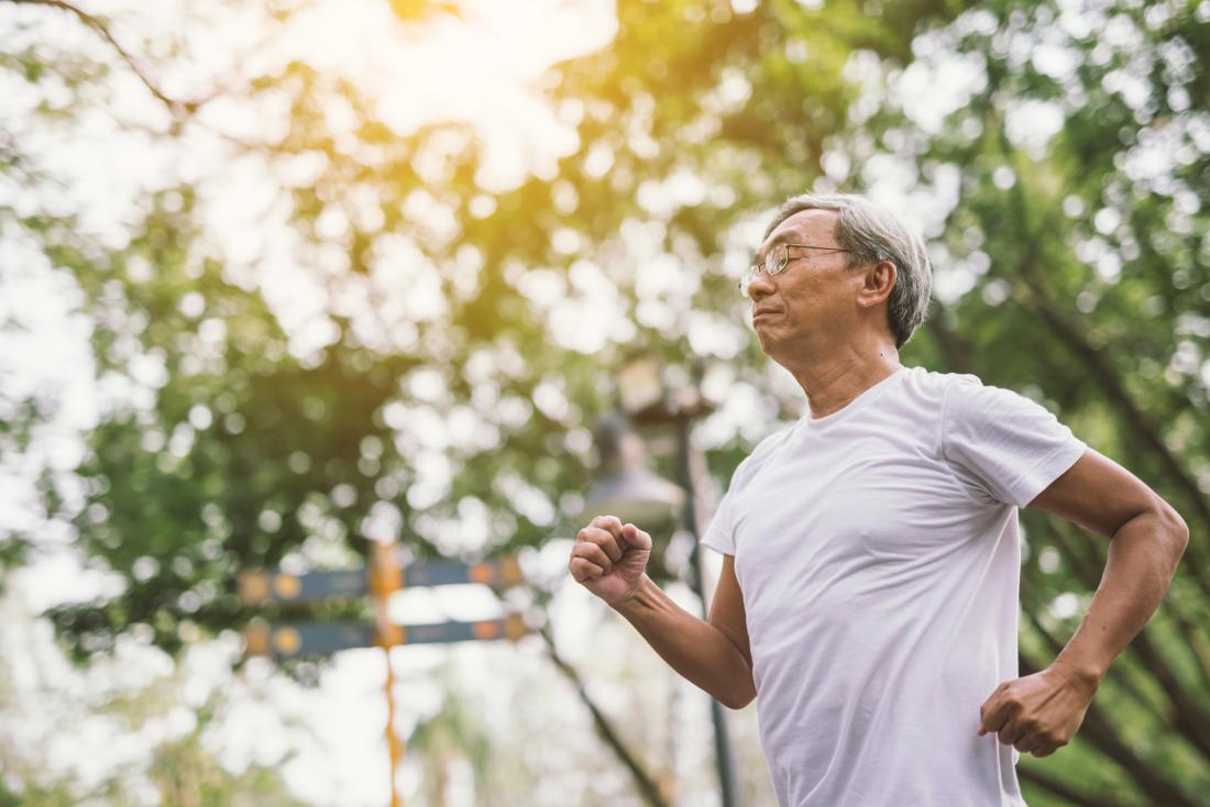 senior man running in the park