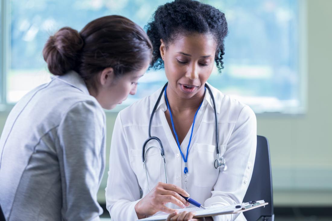 doctor speaking with patient