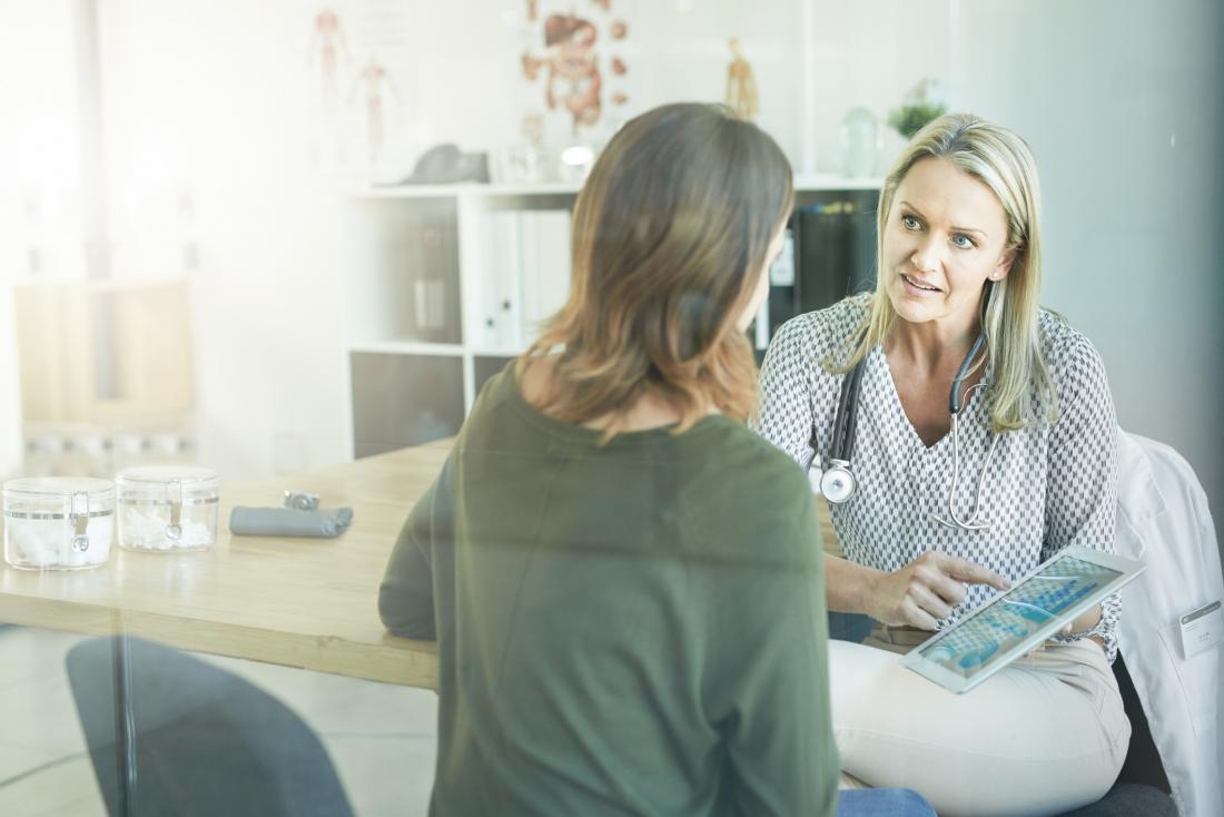 doctor speaking to patient