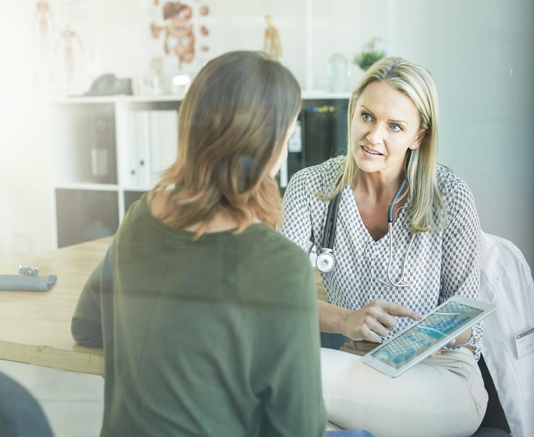 doctor speaking to patient