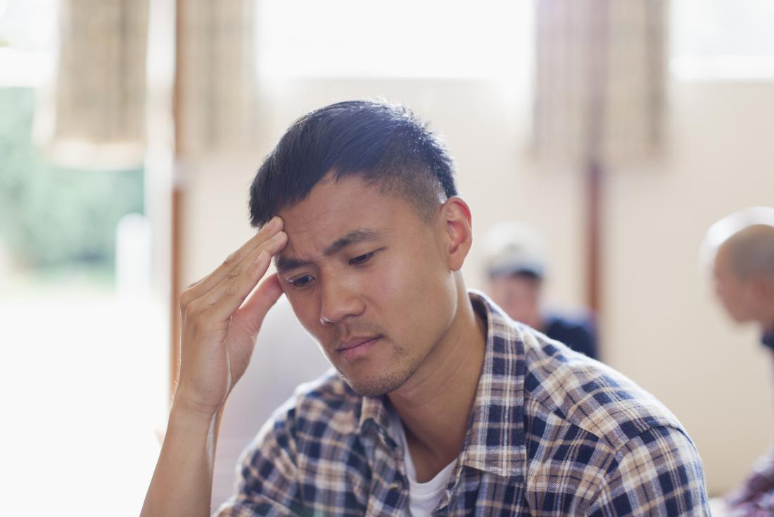 a man looking sad because he is experiencing a chemical imbalance in the brain