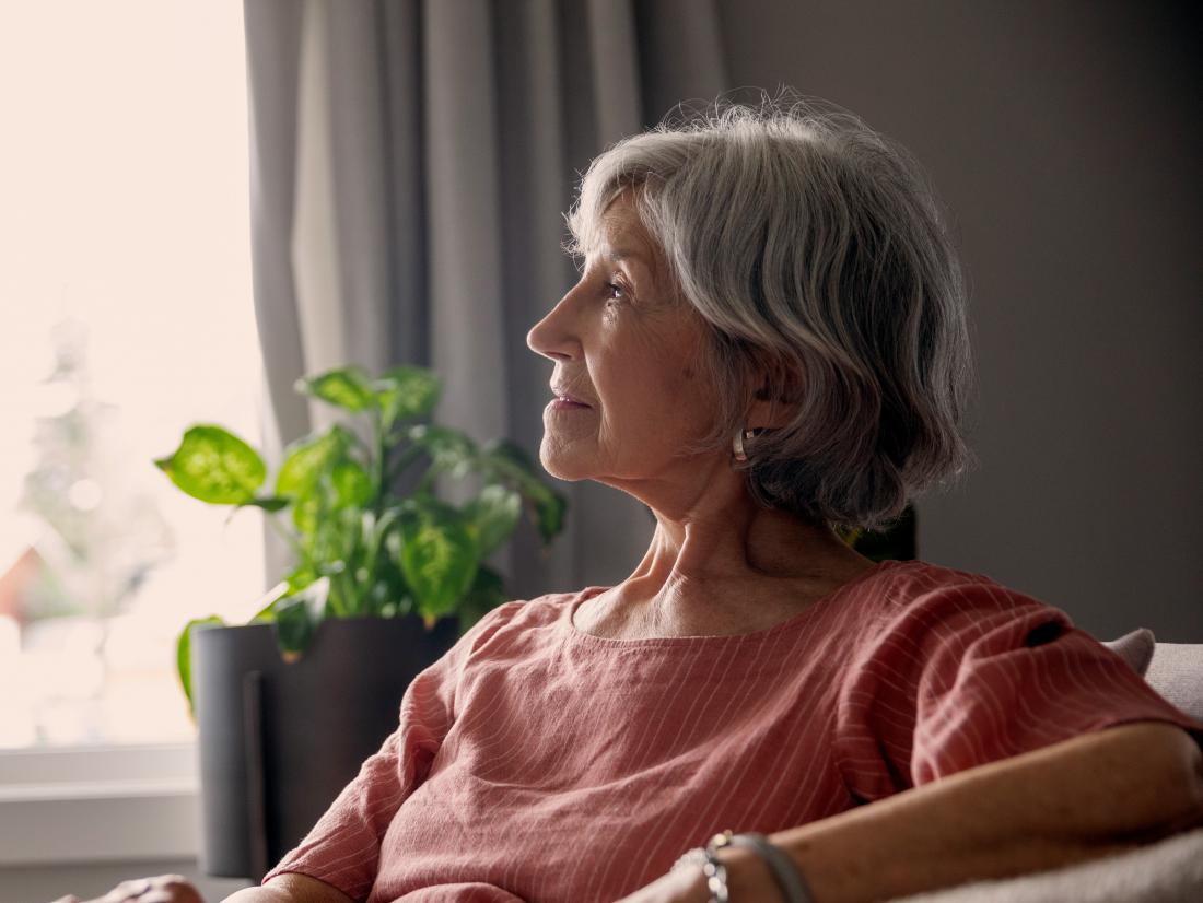 a woman looking pensive because Diabetes is one of the complications of her psoriatic arthritis