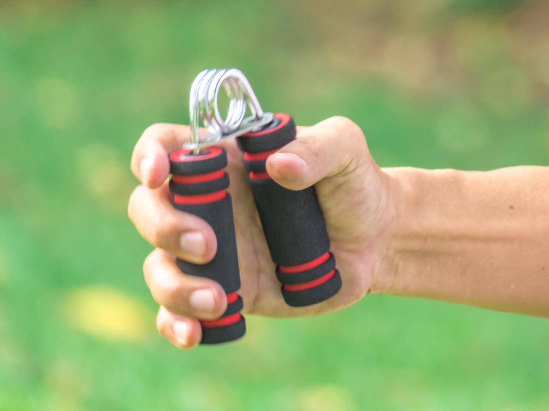 a hand using a Grip strengthener