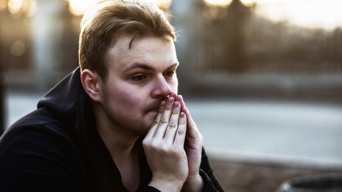 a man looking sad because he is experiencing both Depression and anxiety
